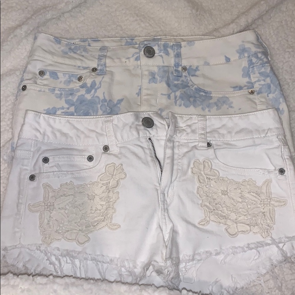 two pairs of American Eagle shorts